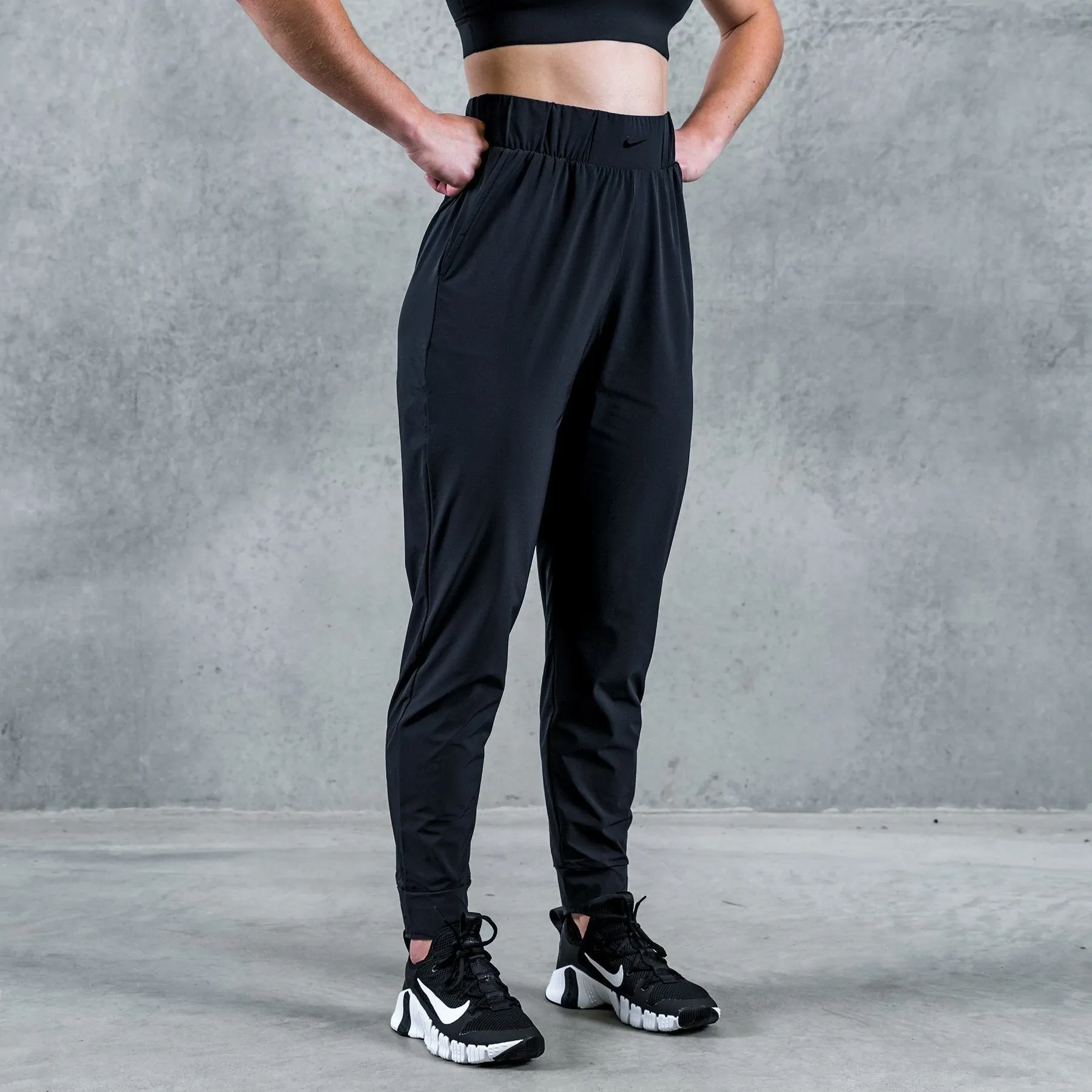 Nike Bliss - Women's Trousers - Black/Clear