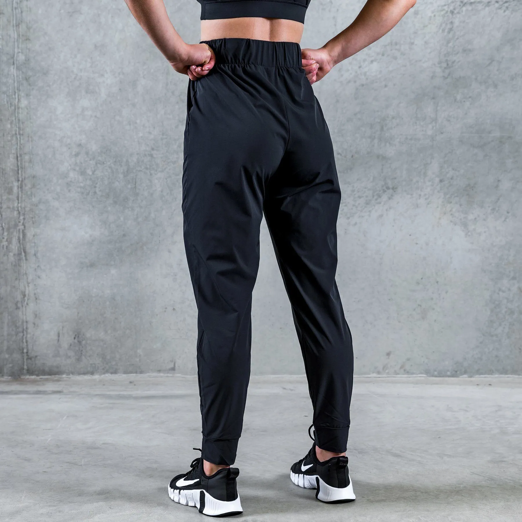 Nike Bliss - Women's Trousers - Black/Clear